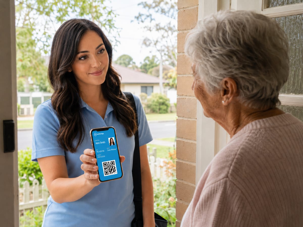 A community care worker showing her digital ID at a client's front door